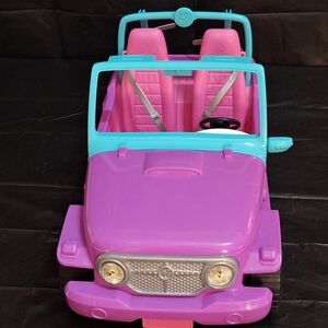 Vibrant Pink and Blue Barbie Jeep